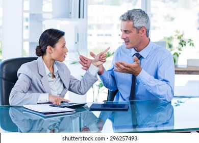 Business People Having Argument In Office