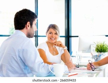 Business people having discussion in office - Shutterstock ID 266059433