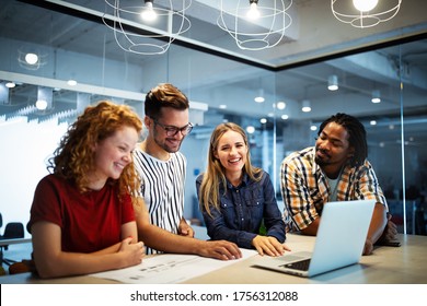 Business People Having Fun And Chatting At Workplace Office