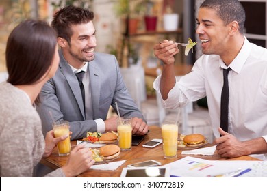 Business people Having Meeting In Outdoor Restaurant 
