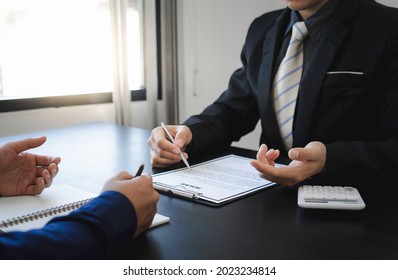 Business people hold a resume and talk to job applicants for job interviews about careers and Their personal history in the company. Recruitment concepts - Shutterstock ID 2023234814