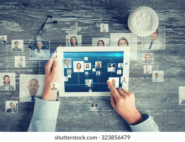 business, people, international communication, headhunting and technology concept - close up of hands pointing finger to tablet pc computer screen with world map and internet contacts network on table - Shutterstock ID 323856479