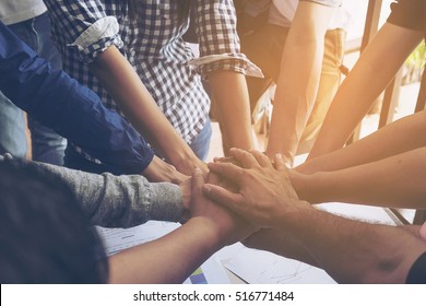 Business people join hand together during their meeting - Shutterstock ID 516771484