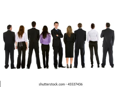 Business people in line from behind and a man facing the camera isolated