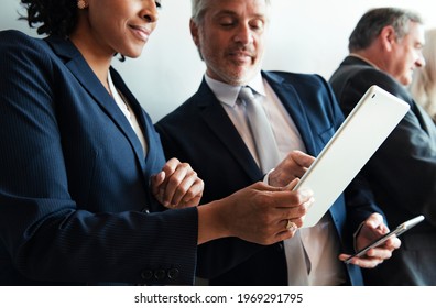 Business People Looking At Digital Tablet