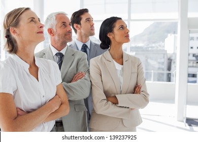 Business People Looking At The Same Way In The Workplace