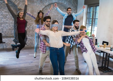 Business People Making Team Training Exercise During Team Building Seminar, Play A Game Of Trust