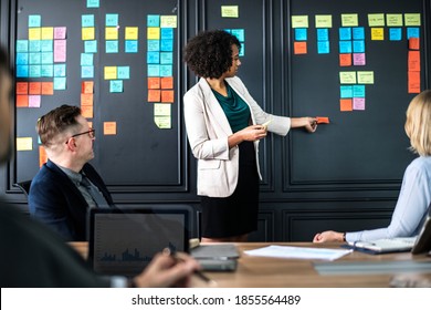 Business people in a meeting - Powered by Shutterstock