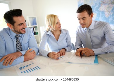 Business People Meeting Around Table