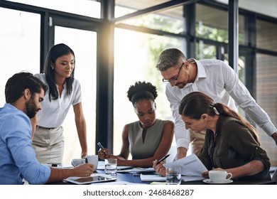 Business people, meeting and budget planning in boardroom for audit and financial logistics with paperwork. Corporate group, teamwork and company review for discussion about spending and resources - Powered by Shutterstock