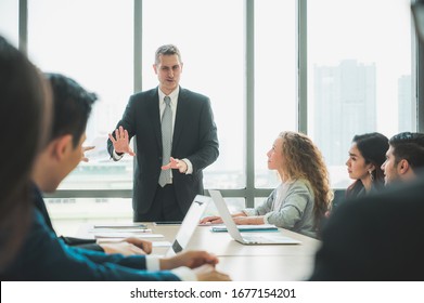 Business People Meeting Conference Discussion Corporate Concept in office. Team of newage Multiethnic Diverse Busy Business People in seminar Concept.