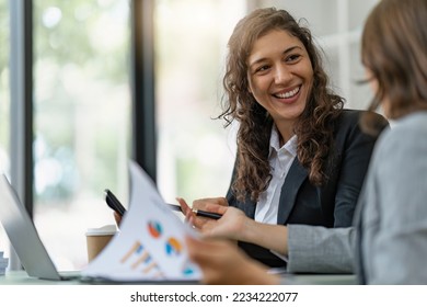 Business People Meeting to discuss and brainstorming the financial report paperwork in home office. Financial advisor teamwork and accounting concept. - Shutterstock ID 2234222077