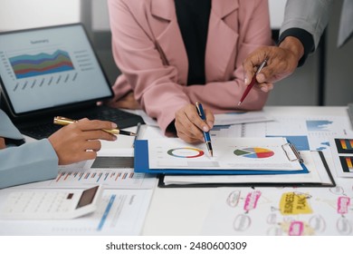 Business people meeting, discussing growth strategies, analyzing data, and planning for success. Teamwork, collaboration, finance, strategy, marketing - Powered by Shutterstock