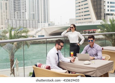 Business People At Meeting In Dubai Marina.