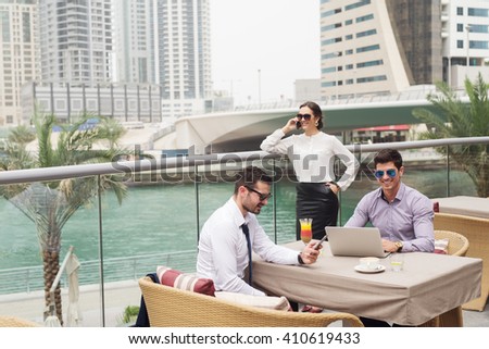 Business people at meeting in Dubai Marina.