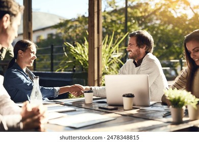 Business people, meeting and handshake at cafe for introduction, onboarding and remote work opportunity. B2b worker or clients shaking hands at coffee shop of group project deal, interview or success