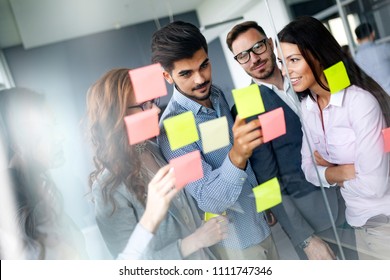 Business People Meeting At Office And Use Post It Notes To Share Idea