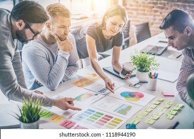 Business people meeting at office and use post it notes to share idea. Brainstorming concept. Sticky note on glass wall. - Shutterstock ID 1118944190