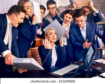 Business People Office. Team People Are Unhappy With Their Leader. Intern Manager Does Not Cope With His Duties. Crowd In Stress.