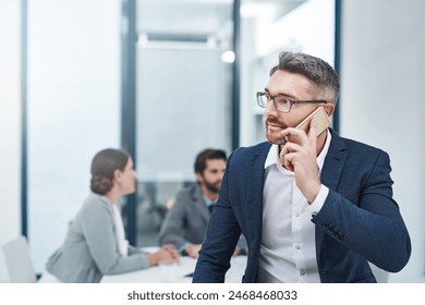 Business people, phone call and man with conversation, planning and network for communication. Group, employees and consultant with cellphone, digital app and contact with review, talking or feedback - Powered by Shutterstock