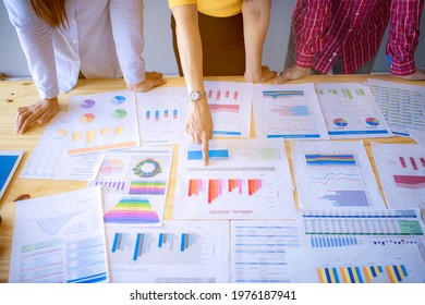 Business people are planning and analysis data figures to plan business strategies. - Shutterstock ID 1976187941