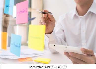 business people planning startup project placing sticky notes session to share idea on glass wall, Strategy Analysis Office Concept - Shutterstock ID 1770307382
