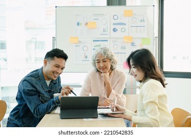 Business People Pointing Pen On Report In Tablet To Discuss Project In Meeting Room.Business Meeting Time.Business Concept.