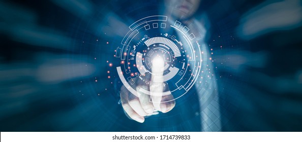 Business People Are Pointing At The Technology Circle Which Is Like The Future There Is Light On The Finger. Technology Concepts For The Future On A Black Scene.