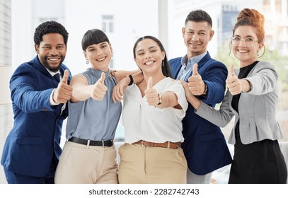 Business people, portrait and thumbs up for winning, good job or team success together at the office. Group of happy employee workers showing thumb emoji with smile for yes sign or like in agreement - Powered by Shutterstock