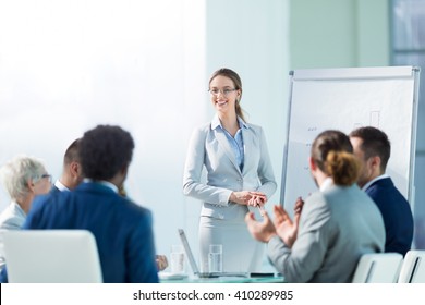 Business People At Presentation In Office