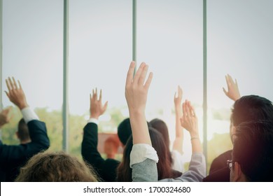 Business People Raising Hand Up To Ask Question With Speaker In Eminar Conference, Raise Hands Up To Agree Or Vote For Comments In The Meeting