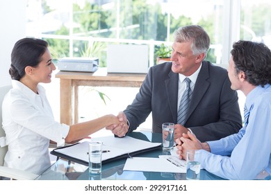 Business People Reaching An Agreement In An Office