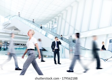 Business People At Rush Hour In Office Building