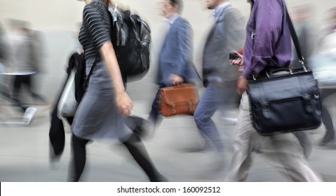 Business People At Rush Hour Walking In The Street, In The Style Of Motion Blur