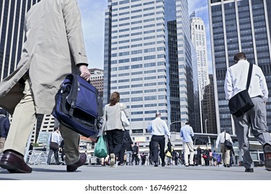 Business People At Rush Hour Walking In The Street