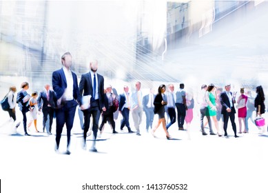 Business people rushing in the City of London against on the skyscrapers. Beautiful abstract blurred image representing modern business life, success, moving concept.