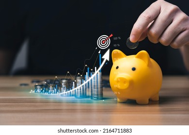 business people save money in piggy bank and goal and achievement chart graph and arrows. Concept Buying Funds Loans and Investment Profits. accumulate assets, wealth, lucrative