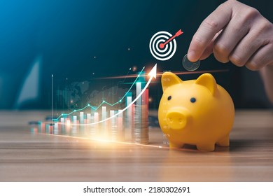 business people save money in piggy bank and goal and achievement chart graph and arrows. Concept Buying Funds Loans and Investment Profits. accumulate assets, wealth, lucrative - Shutterstock ID 2180302691