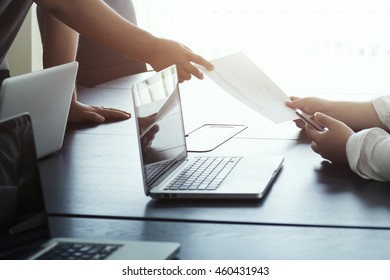 Business People Send Chart Document And Discussing The Charts And Graphs Showing The Results Of Their Successful Teamwork In Meeting Room, Selective Focus. Business Concept Idea Background.