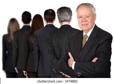 Business People In A Series With A Senior Boss Standing Facing The Camera