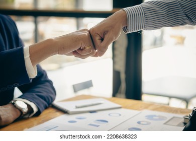 business people shake hands to make an agreement during a board meeting in the office Teamwork, agreement, cooperation, real estate business concept. - Shutterstock ID 2208638323