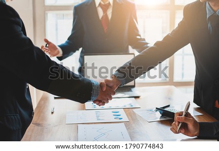 Business people shake hands with business partners at a meeting. The concept of organizational dispute settlement. Stock foto © 