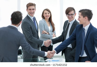Business people shaking hands.