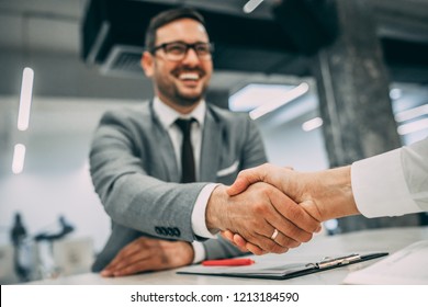 Business people shaking hands. - Shutterstock ID 1213184590