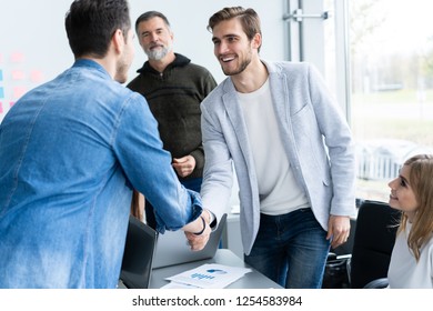 Business people shaking hands, finishing up a meeting. Handshake. Business concept