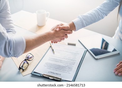 Business people shaking hands, finishing up meeting. Successful businessmen handshaking after good deal. - Shutterstock ID 2146581713