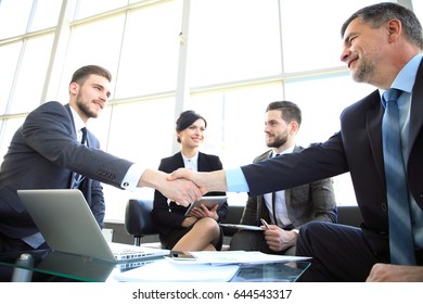 Business People Shaking Hands, Finishing Up A Meeting