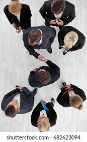 Business People Shaking Hands, Finishing Up A Meeting, Top View With Copy Space