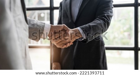Business people shaking hands, finishing up meeting, business etiquette, congratulation, merger and acquisition concept