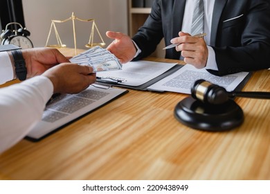 Business People Shaking Hands And Give An Under-the-table Bribe To An Attorney To Help A Lawyer Win A Court Case. Bribery And Kickback Ideas Fraud And Fraud